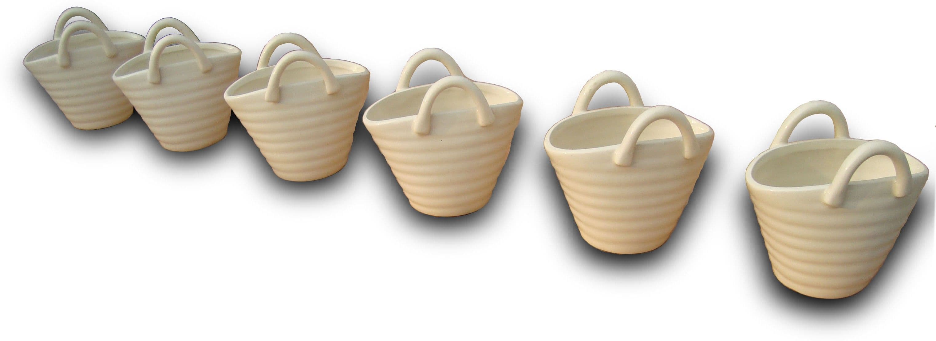 Shreewardhan Decor Add a lively touch of artificial to your decor with these Succulent offwhite Ceramic Baskets Plant Plant Container Set